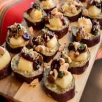 Roasted Sweet Potato Coins with Port Salute, Marcona Almonds and Bourbon Spiced Cranberries_image