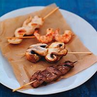 Grilled Beef, Chicken, Shrimp, and Mushroom Skewers image