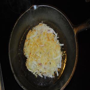 Spicy Hash Browns W/Eggs Sunny-Side Up_image