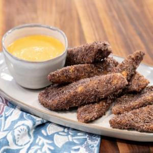 Blue Corn Chip-Crusted Fish Sticks with Red Pepper Coulis image