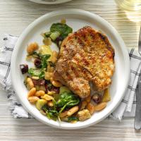 Dry-Rub Grilled Pork Chops over Cannellini Greens image