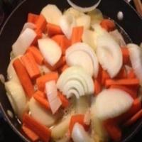Pork Chops, Potatoes, Carrots, and Onions image