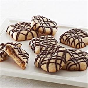 Sugar Cookies with Caramel Pockets and Chocolate Drizzle_image