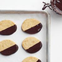 Chocolate-Dipped Macadamia Cookies image