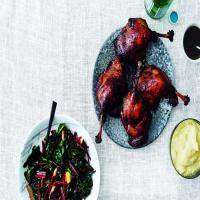 Braised Duck Legs With Polenta And Wilted Chard image