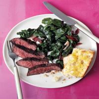 Steak with Swiss Chard and Garlic Bread image