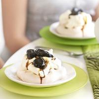 Spiced meringues with coffee-soaked prunes image