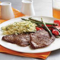 Pork Cutlets with Couscous and Sauteed Peppers and Asparagus_image