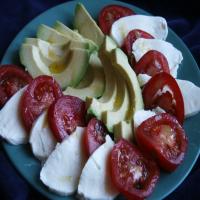 Mozzarella Avocado and Tomato Salad in Vinaigrette_image