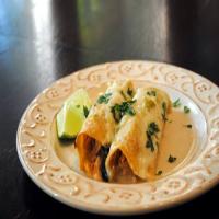Garlic Pork Enchiladas with Green Chile Sour Cream Sauce Recipe - (4.6/5)_image