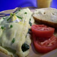 French Omelet With Spinach & Swiss Cheese_image