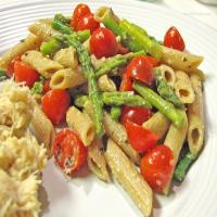 Penne With Cherry Tomatoes, Asparagus, and Goat Cheese image