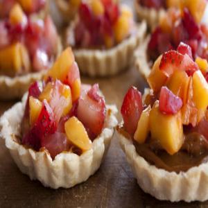 Rustic Tartlets Filled with Dulce de Leche, Strawberries and Mango image