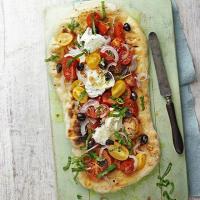 Garlic pizza with tomato & mozzarella image