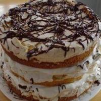 Almond Cake With Meringue and Whipped Cream Filling image