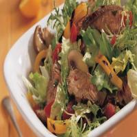 Tossed Steak Salad with Spicy Garlic Dressing image