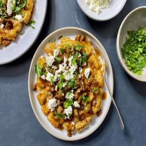 Tater Tot Waffles with Saucy Sausage and Feta_image