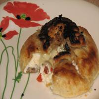 Brie En Croute Stuffed With Olives & Roasted Peppers_image