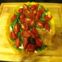 Polenta tart with goat cheese, arugula and roasted Campari tomatoes Recipe - (4.6/5) image