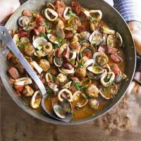 Spanish meatballs with clams, chorizo & squid image