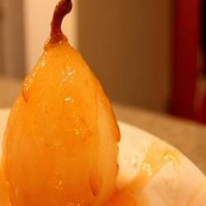 Flambeed Vanilla-Poached Pears with Apricot Sauce_image