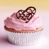 Raspberry Cupcakes with Pink Buttercream and Lacy Chocolate Hearts image