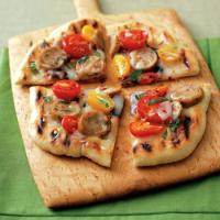 Pizza with Sausage, Tomatoes and Basil image