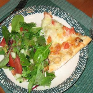Pizza With Fresh Tomatoes and Basil image