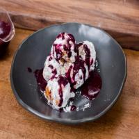 Biscuit Doughnuts with Lemon Cream Filling and Blueberry Sauce image
