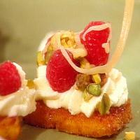 Sweet Polenta Crostini with Mascarpone, Raspberries, Pistachios, and Lavendar Honey image