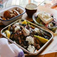 Roast Greek Lamb with Tzatziki, Roasted Vegetables, and Greek salad image