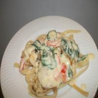 Garlic chicken with creamy sauce & spinach image
