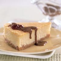 Mascarpone Cheesecake with Candied Pecans and Dulce de Leche Sauce_image