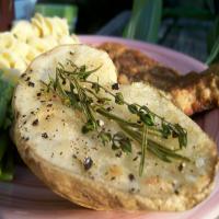 Roasted Potato Halves With Herb Sprigs_image