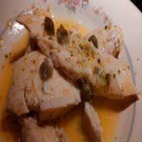 Poached Chicken in Olive Oil, Garlic, and Green Peppercorn Sauce image