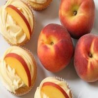 Peach cupcake with peach cream cheese_image