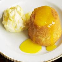 Tangy lemon pudding with lemon meringue ice cream image