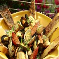 Grilled Andouille Sausage with Shrimp, Clams, Mussels and Garlic with Grilled Country Bread with Anchovy Butter image