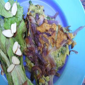 Onion and Fresh Herb Omelet With Mixed Greens image
