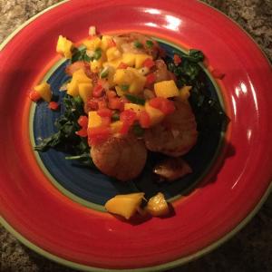 Scallops with Mango Salsa on Fresh Spinach image