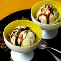 Coconut-Corn Ice Cream with Brown-Sugar Syrup and Peanuts image