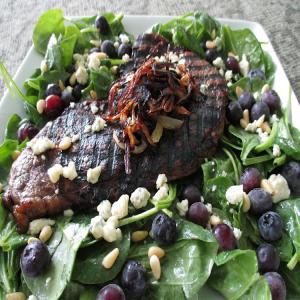 Steak and spinach salad with blueberries image