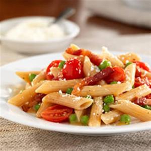 Barilla PLUS® Penne with Pancetta, Grape Tomatoes, Peas, and Romano Cheese_image