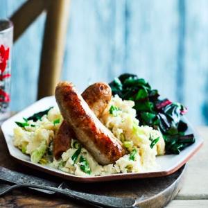 Herby sausages with butter bean mash image