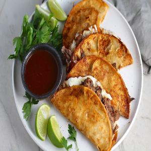 Easy Birria Tacos with Consomme in the Slow Cooker - Talking Meals_image