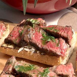 Mini Open Faced Steak Sandwiches on Garlic Bread with Aged Provolone and Parsley Oil_image