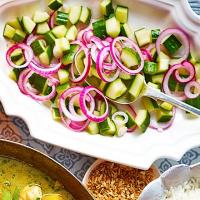 Cucumber salad with pickled red onions image