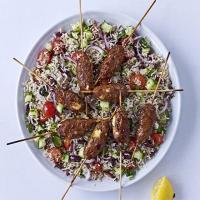 Spicy lamb & feta skewers with Greek brown rice salad image