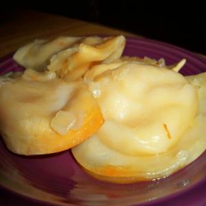 Crock Pot Potluck Pierogies With Sauteed Onions and Butter_image