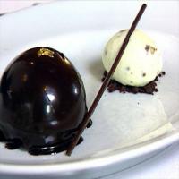 Milk Chocolate Dome with Caramel Cream, Fleur de Sel And Pistachio Crunch Ice Cream_image